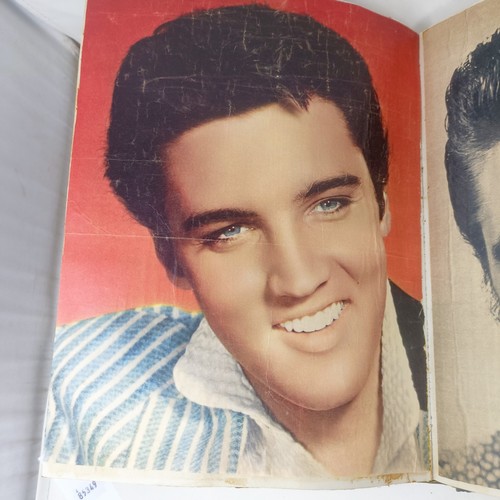 126 - A scrapbook album of the stars, to include Elvis Presley and Cliff Richard, some signed