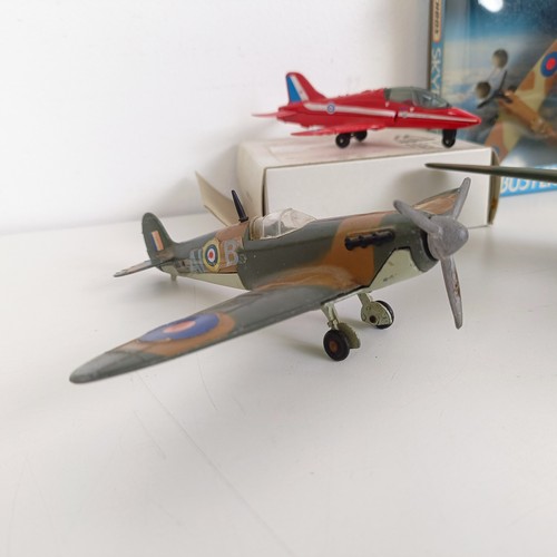 203 - A Dinky Toys model of a Spitfire, and assorted other model planes