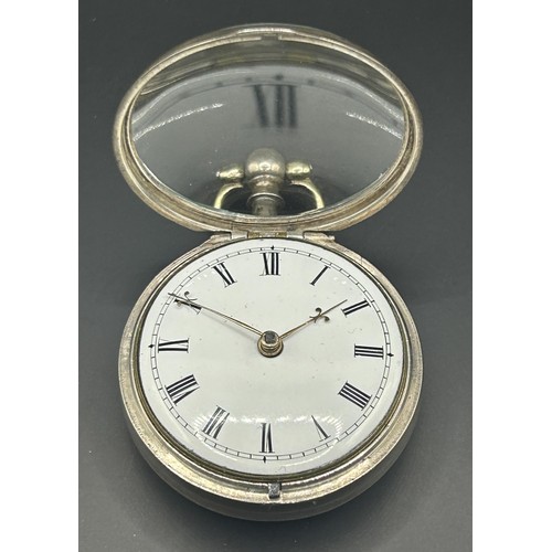 804 - A George IV silver pocket watch, with and enamel dial, and a fusee movement, signed John Wynstanley,... 