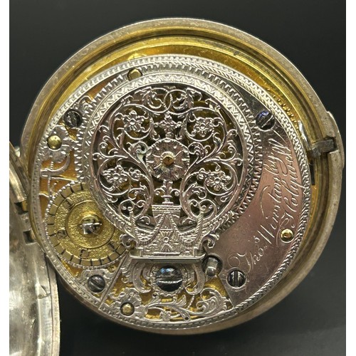 804 - A George IV silver pocket watch, with and enamel dial, and a fusee movement, signed John Wynstanley,... 