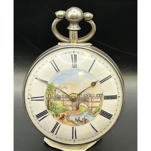 811 - A George III silver pair cased pocket watch, the enamel dial decorated a steam train on a viaduct, w... 