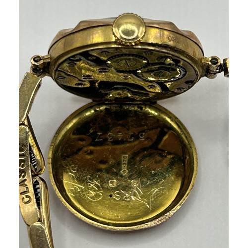 831 - A ladies yellow metal wristwatch, on an expandable strap