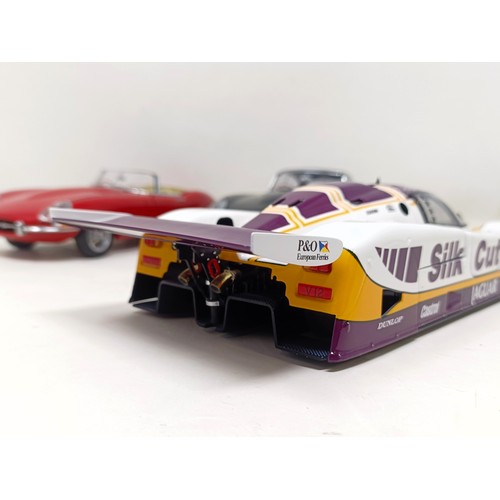 231 - A Motorbox 1:18 model of a Jaguar XJR-9, and two Autoart 1:18 models of an E-Type Jaguar, No 0883, a... 