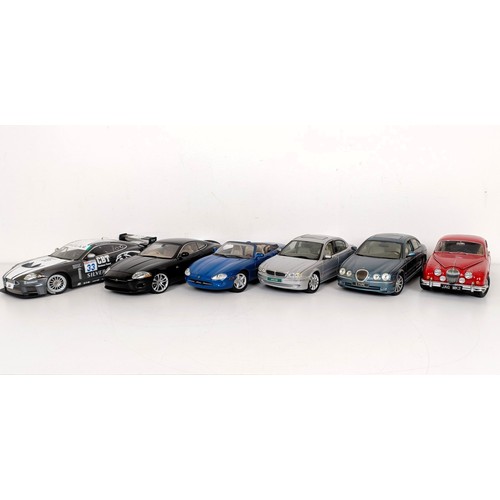 232 - A Minichamps 1:18 model of a Jaguar XKR GT3, and five other models of Jaguars (6)