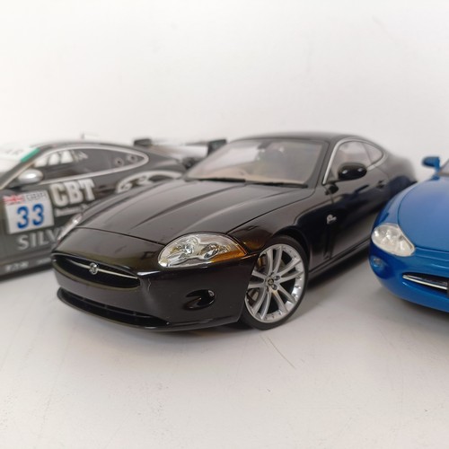 232 - A Minichamps 1:18 model of a Jaguar XKR GT3, and five other models of Jaguars (6)