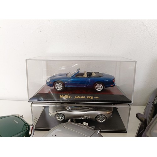 233 - An Autoart 1:18 model of a Jaguar XK SS, and assorted other models (box)