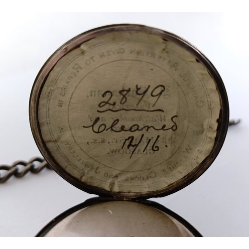 833 - A silver open face pocket watch and an Albert