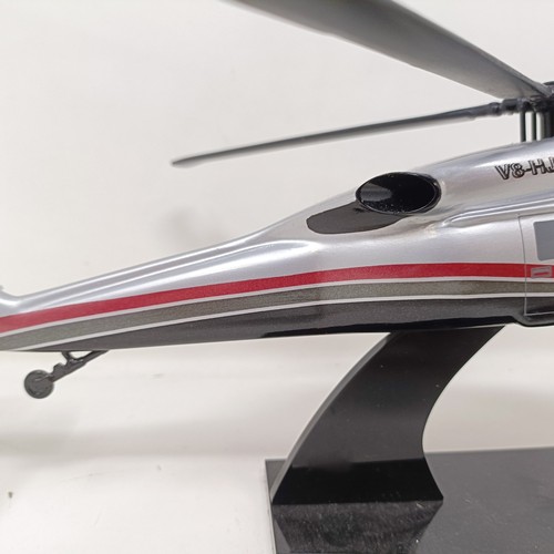 239 - A model of a Sikorsky S-70C helicopter, 33 cm wide