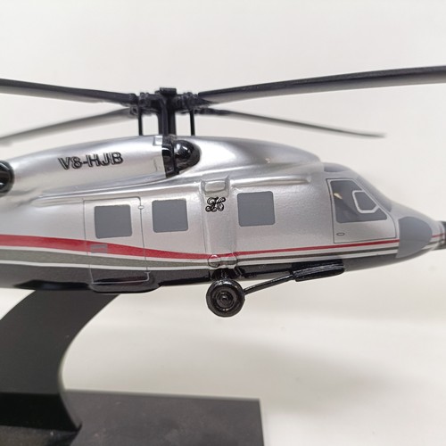 239 - A model of a Sikorsky S-70C helicopter, 33 cm wide