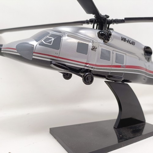 239 - A model of a Sikorsky S-70C helicopter, 33 cm wide