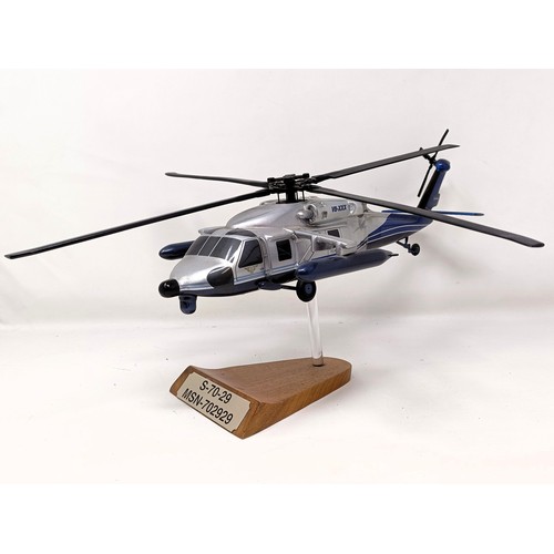 240 - A model of a Sikorsky S70-29 helicopter, 40 cm wide