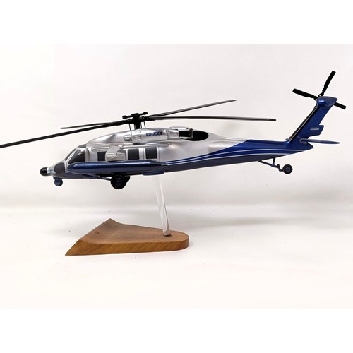 240 - A model of a Sikorsky S70-29 helicopter, 40 cm wide