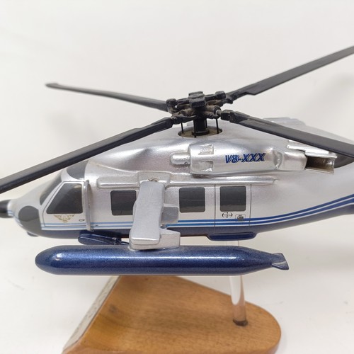 240 - A model of a Sikorsky S70-29 helicopter, 40 cm wide