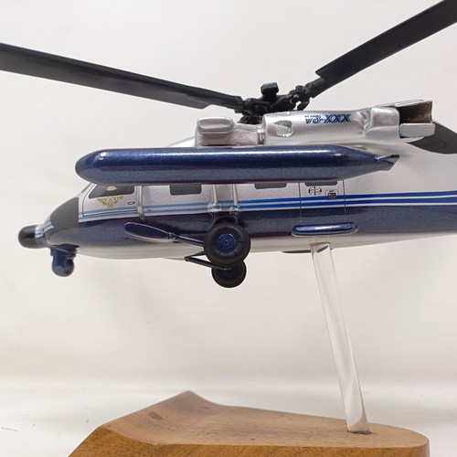 240 - A model of a Sikorsky S70-29 helicopter, 40 cm wide