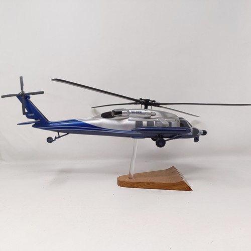 240 - A model of a Sikorsky S70-29 helicopter, 40 cm wide