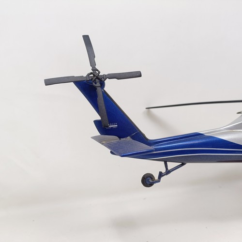 240 - A model of a Sikorsky S70-29 helicopter, 40 cm wide