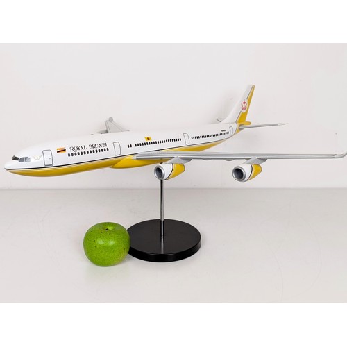 242 - A model of an Airbus A340, on a stand, 58 cm wide