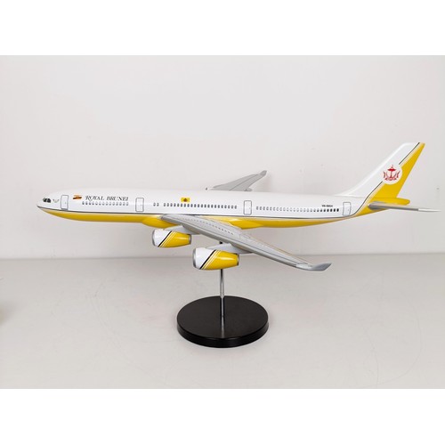 242 - A model of an Airbus A340, on a stand, 58 cm wide