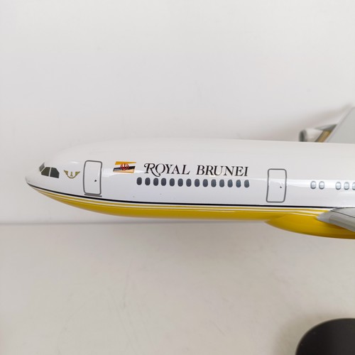 242 - A model of an Airbus A340, on a stand, 58 cm wide