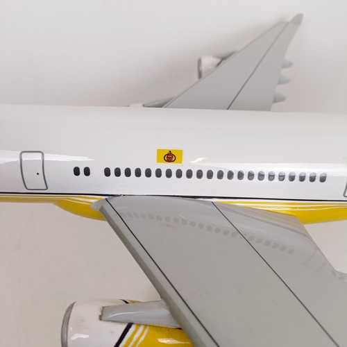 242 - A model of an Airbus A340, on a stand, 58 cm wide