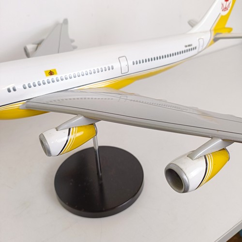 242 - A model of an Airbus A340, on a stand, 58 cm wide