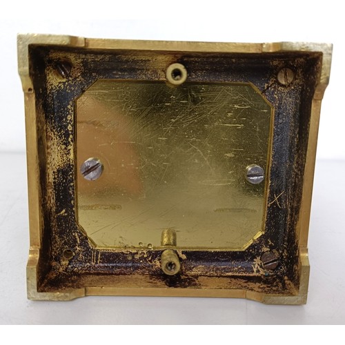 842 - A French carriage clock, with repeast, the silvered dial with alarm dial, in a brass four pillar cas... 