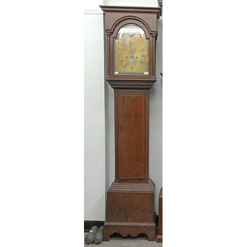 865 - A longcase clock, the brass dial singed Thomas Pyke, with a moon phase to the arch, fitted an eight ... 