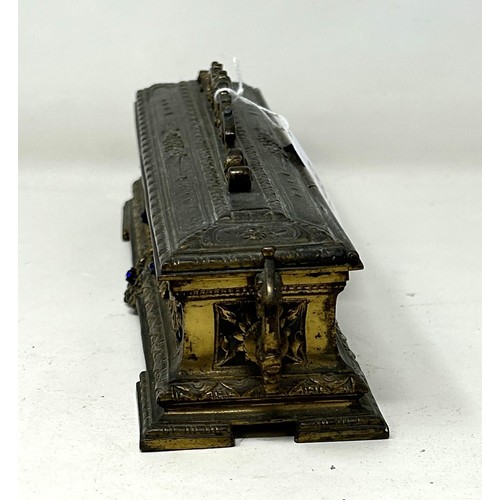 1021 - A gilt brass and bejewelled inkstand, 25 cm wide