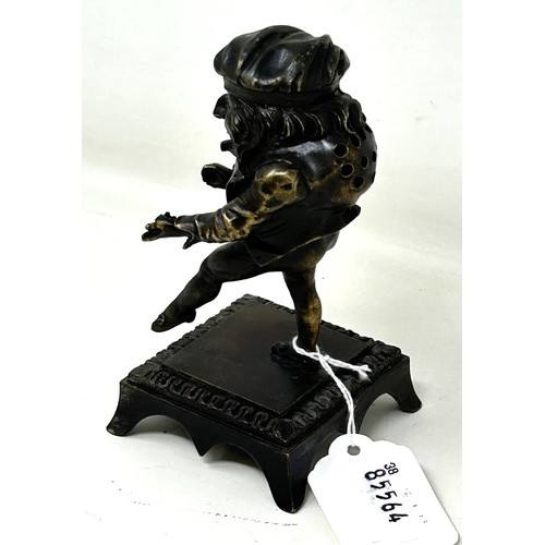1023 - A bronze caricature figure, on a square base, possibly a hat pin stand, 13 cm high