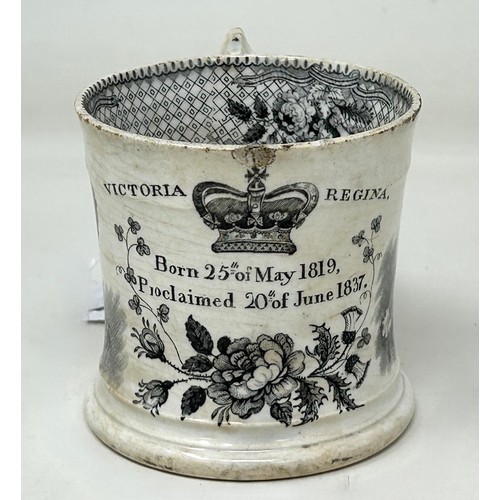 1028 - A Swansea commemorative transfer printed pottery mug, inscribed Victoria Regina, Born 25th May 1819,... 