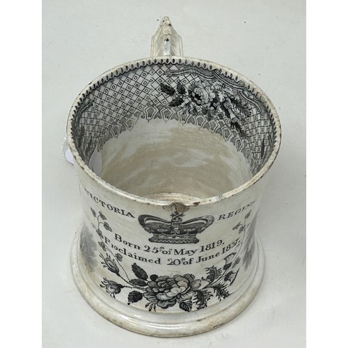 1028 - A Swansea commemorative transfer printed pottery mug, inscribed Victoria Regina, Born 25th May 1819,... 