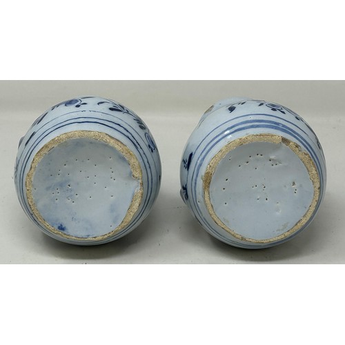 1030 - A small pair of Dutch Delft vases, 14 cm high (2)