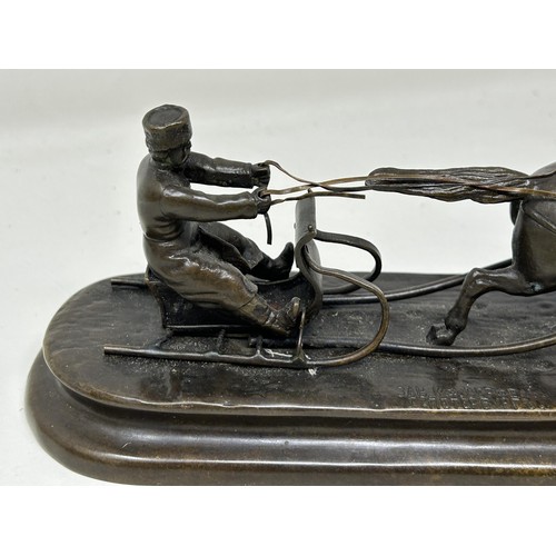 1039 - A bronze group of a Russian in a sleigh, being pulled by a horse, 23 cm wide