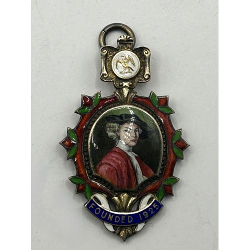 1098 - A George V silver and enamel medal, decorated a portrait