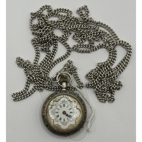 844 - A ladies silver coloured metal fob watch, in an engraved case, stamped .800, in a fitted box, with a... 