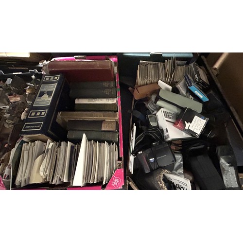 1002 - A Nokia mobile phone, another, assorted cameras, postcards and books (2 boxes) Provenance: Sold on b... 