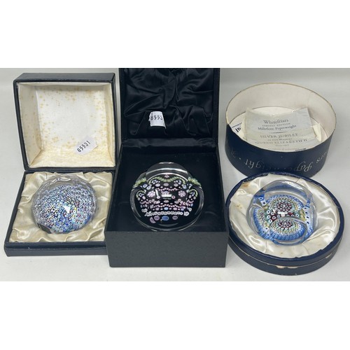 1032 - A Whitefriars commemorative glass paperweight, boxed, and two other glass paperweights (3)