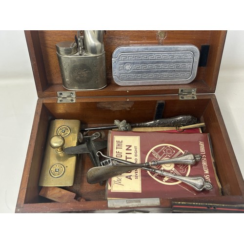 1034 - A Chinese silver plated pipe, and other items, in a mahogany box