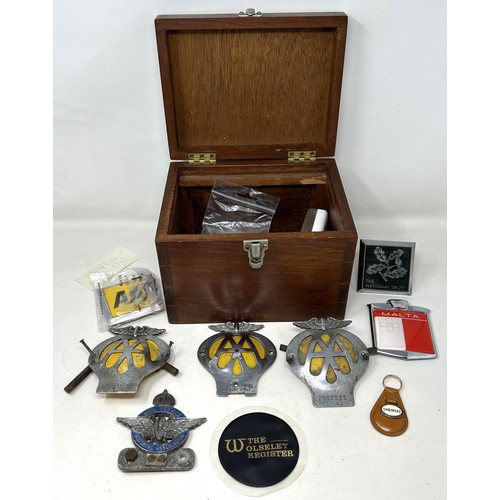 1036 - An AA car badge and other items, in a mahogany box