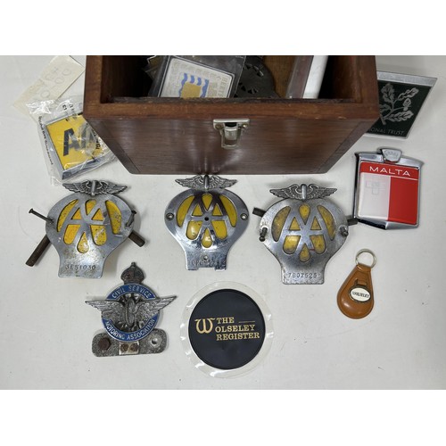 1036 - An AA car badge and other items, in a mahogany box
