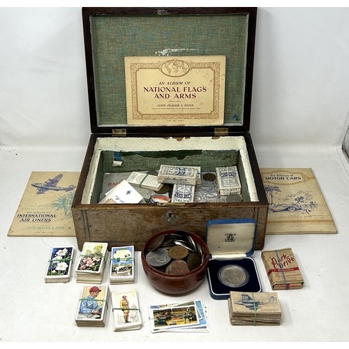 1037 - Assorted coins and cigarette cards, in a rosewood box