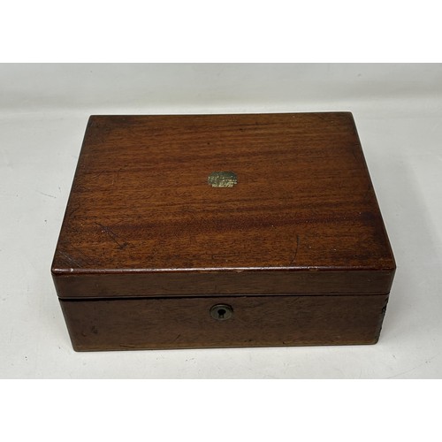 1038 - A mahogany writing slope, a hand mirror and assorted other items