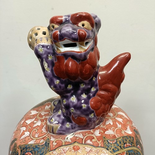 1149 - A large Japanese Imari temple vase, cover and stand