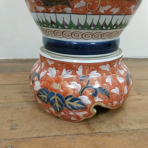 1149 - A large Japanese Imari temple vase, cover and stand