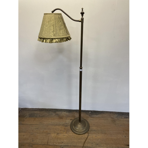 1292 - A brass adjustable fender and a standard lamp (2)