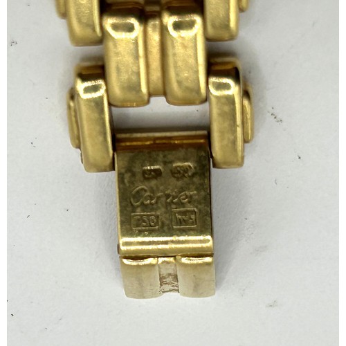 829 - A ladies 18ct gold Cartier Tank Quartz wristwatch, with cabochon winder, 42 g (all in)