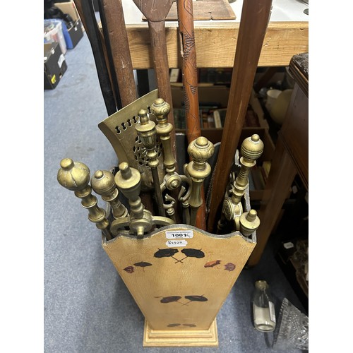 1001 - A stick stand, an African carved wood leaf paddle, and other items