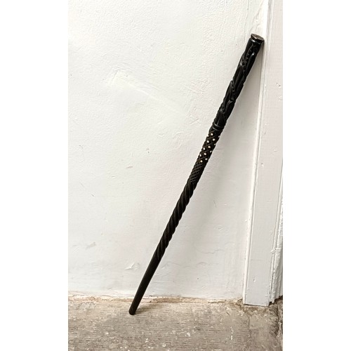 1121 - A carved ebony walking stickProvenance: Part of a single owner collection of walking sticks and rela... 