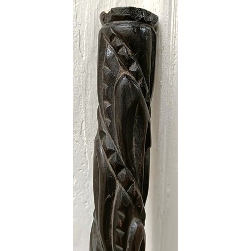 1121 - A carved ebony walking stickProvenance: Part of a single owner collection of walking sticks and rela... 