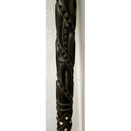 1121 - A carved ebony walking stickProvenance: Part of a single owner collection of walking sticks and rela... 